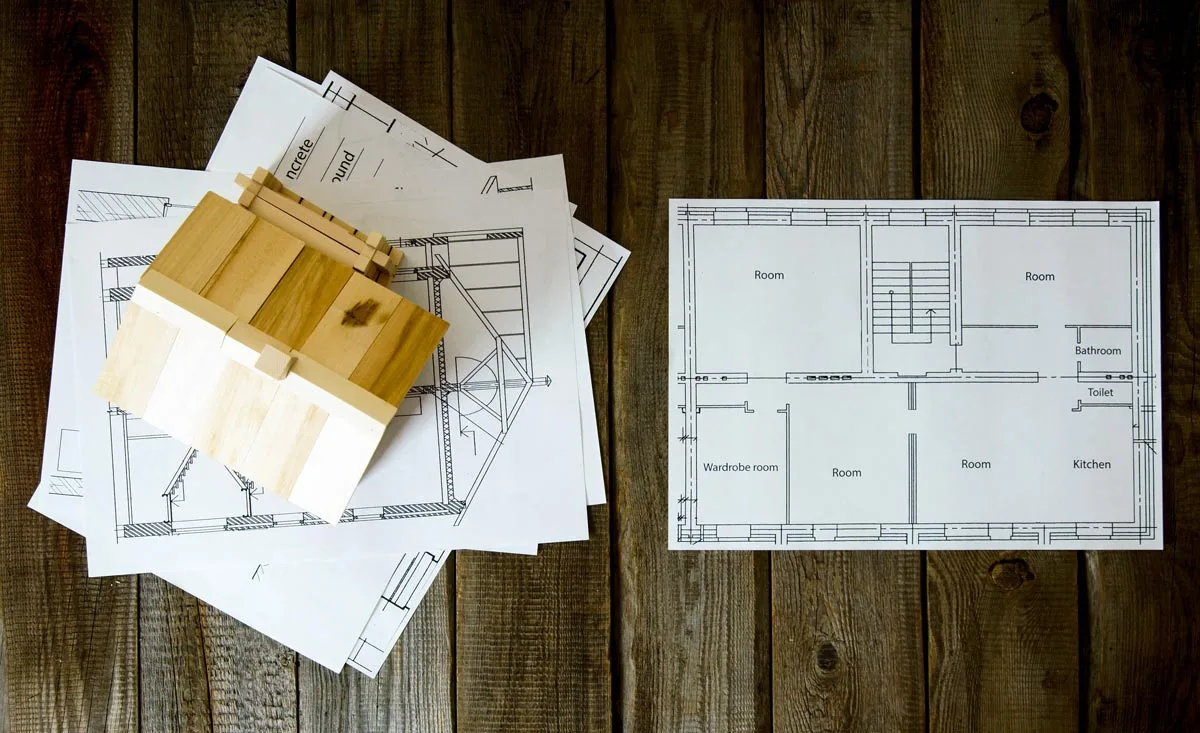 A Designer Collaborates With A Melbourne Client On Custom Home Designs