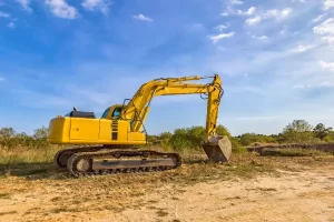 Heavy Machinery Like Excavators And Cranes Used In Mechanical Demolition