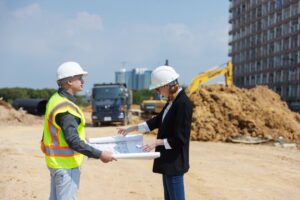 Commercial Builder Project Manager Discussing Building Plans
